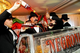 Bartenders mix the "world's largest Negroni" at Tales of the Cocktail